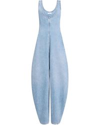 Alaïa - Alaa Round Denim Jumpsuit - Lyst