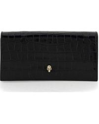 McQueen - Skull Embossed Clutch Bag - Lyst