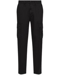 Stone Island - Logo Patch Tapered Leg Trousers - Lyst