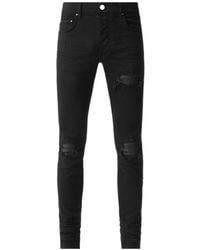 Amiri - Mx1 Distressed Jeans - Lyst