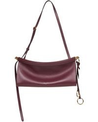 Alaïa - Alaïa Logo Stamp Small East West Shoulder Bag - Lyst