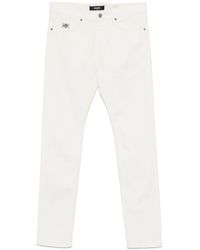 Versace - Tapered Leg Jeans - Lyst