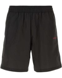 Off-White c/o Virgil Abloh - Logo Detailed Swim Shorts - Lyst