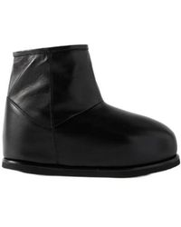 AMINA MUADDI - Heidi Shearling-Lined Leather Boots - Lyst