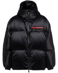 Prada - Oversized Technical Re-Nylon Down Jacket - Lyst