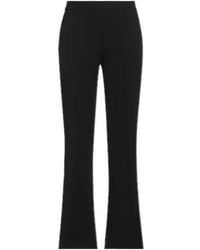 Tory Burch - Solid Color Spliced Flared Pants - Lyst