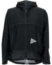 and wander - Logo Printed Hooded Jacket - Lyst