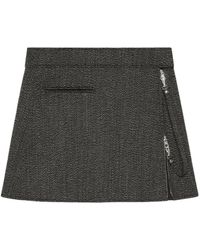 Courreges - Courrèges Zipped Caviar Mini Skirt - Lyst