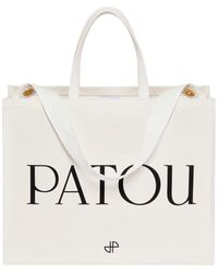 Patou - Logo-Printed Top Handle Bag - Lyst
