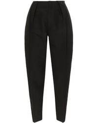 Bottega Veneta - Pleated Tapered Trousers - Lyst