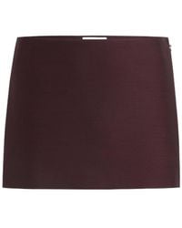 KHAITE - Jett Fitted Mini Skirt - Lyst