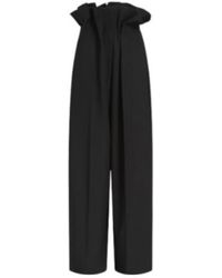 KHAITE - High-Waisted Pleated Trousers - Lyst