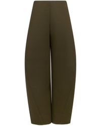 Alaïa - Alaïa High-Waist Twisted Pants - Lyst