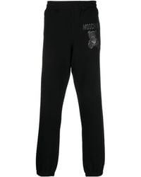 Moschino - Logo-Print Organic Cotton Track Pants - Lyst