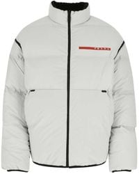 Prada - Reversible Cropped Light Re-Nylon Down Jacket - Lyst