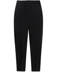 Issey Miyake - Campagne Tapered Pleated Trousers - Lyst