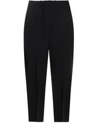 Issey Miyake - Campagne Tapered Pleated Trousers - Lyst