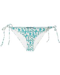 Versace - Allover Logo-Printed Swimsuit Bottoms - Lyst