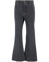 Valentino - Logo Patch Flared Jeans - Lyst