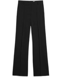 TOTEME - Totême Belt-Looped Mid-Rise Trousers - Lyst