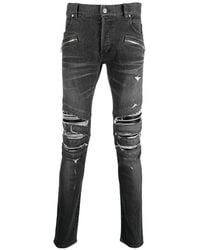 Balmain - Slim-Cut Ripped Cotton Jeans With Synthetic Leather Panels - Lyst
