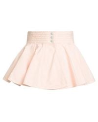Alaïa - Alaïa Peplum Denim Mini Skirt - Lyst