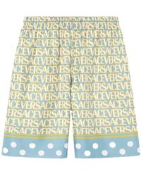 Versace - All-Over Logo Printed Knee-Length Shorts - Lyst