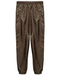 MISBHV - Monogram Printed Tapered-Leg Trackpants - Lyst