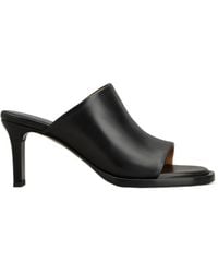 Tod's - Logo Debossed Slip-On Mules - Lyst