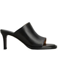 Tod's - Logo Debossed Slip-On Mules - Lyst
