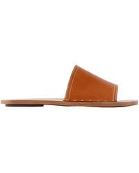 TOTEME - Studded Leather Slides - Lyst