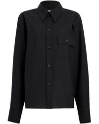 KHAITE - Yatty Long Sleeved Button-Up Top - Lyst