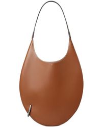 Tory Burch - Pierced Soft Shoulder Bag - Lyst