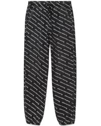 Alexander Wang - Logo Print Tapered Jeans - Lyst
