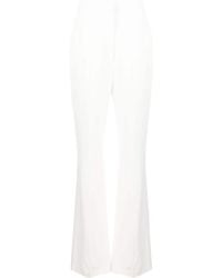 McQueen - High-Waist Flared Tailored Trousers - Lyst