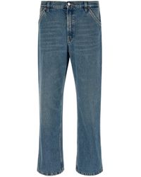 Prada - Logo-Patch Denim Jeans - Lyst