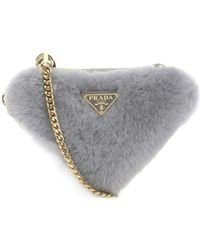 Prada - Shearling And Saffiano Leather Mini-Pouch - Lyst