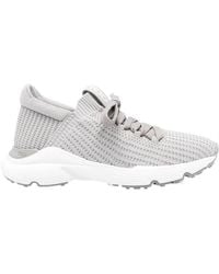 Tod's - Logo Embossed Lace-Up Sneakers - Lyst