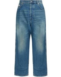 Moschino - Vintage Effect Logo Patch Jeans - Lyst