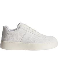 Dior - Monogram Embossed Low-Top Sneakers - Lyst