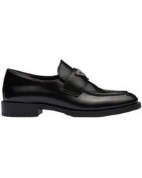 Prada - Logo Plaque Almond-Toe Loafers - Lyst