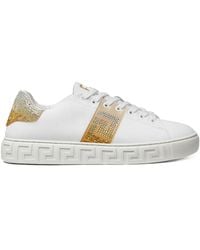 Versace - Greca-Embellished Lace-Up Sneakers - Lyst