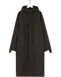 Lemaire - Pocket-Detail Hooded Raincoat - Lyst