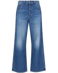 KHAITE - Buttoned Flared Jeans - Lyst