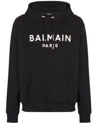 Balmain - Logo Printed Drawstring Hoodie - Lyst