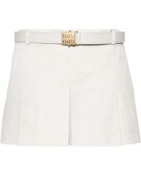 Miu Miu - Low-Rise Logo-Buckle Pleated Mini Skirt - Lyst
