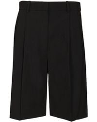 KHAITE - Auggie Pleated Knee-Length Shorts - Lyst