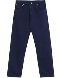 Prada - Logo Plaque Straight-Leg Jeans - Lyst