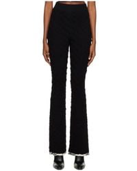 Ambush - High-Waisted Monogram Flared Trousers - Lyst