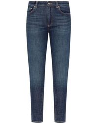 Dolce & Gabbana - Logo Plaque Tapered Leg Jeans - Lyst